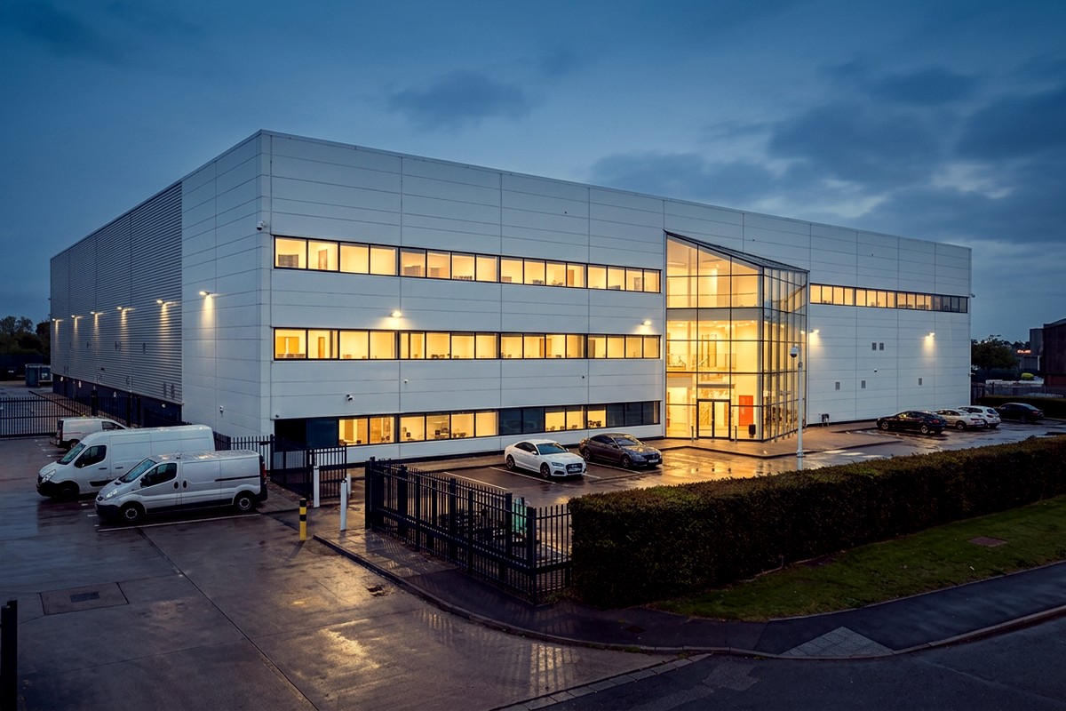 Serverfarm's LON1 data centre in Feltham, London, lit at dusk
